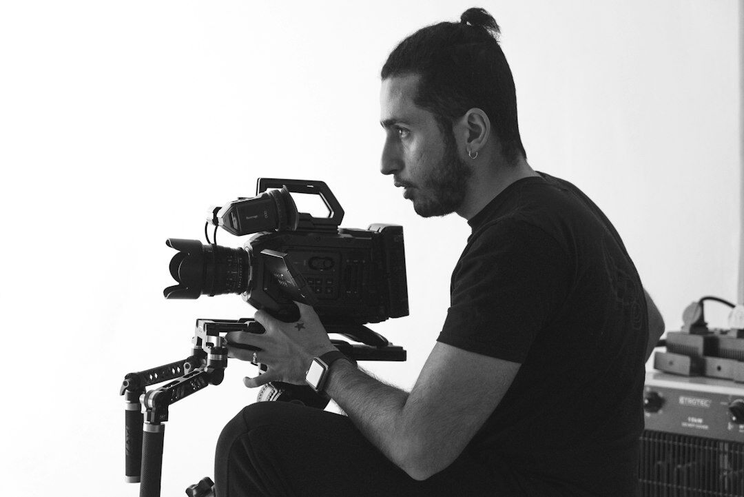 director viewing through camera