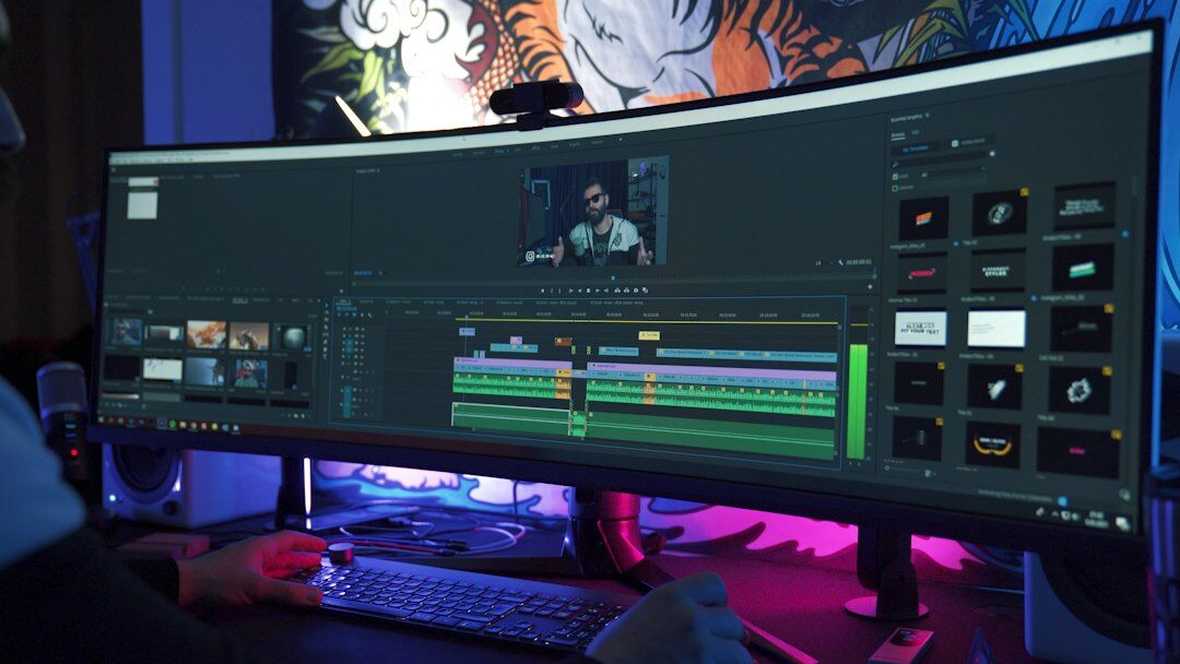 filmmaker editing video on computer